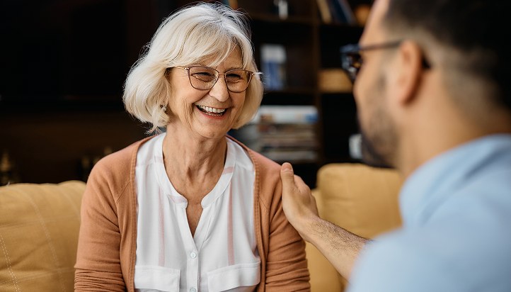 Caregiver and patient in conversation