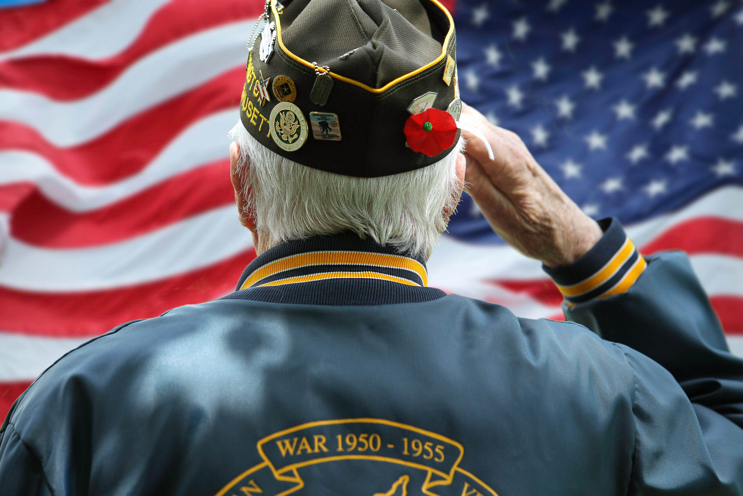 Veteran’s Saluting in Front of US Flag