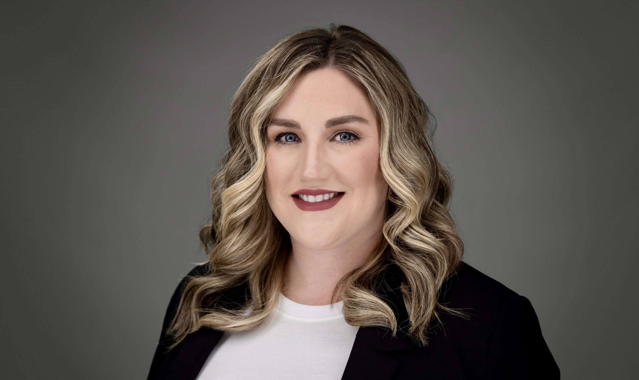 headshot of Kristin Chafin wearing white shirt and black blazer